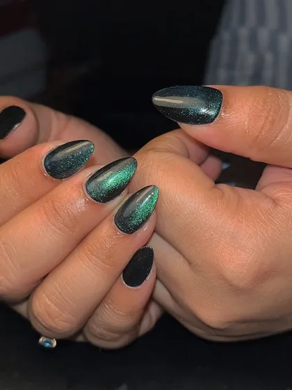 A touch of the universe on your nails. This is a beautiful green cat eye effect that looks like a distant galaxy.
