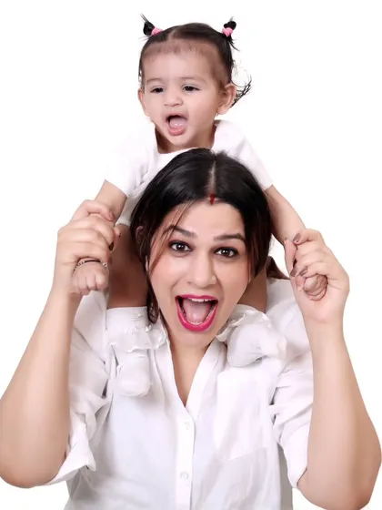 A fun and expressive portrait of a mother and her daughter.
