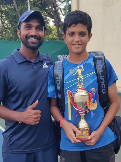 Om Verma with his coach after winning the Doubles title at the All India Super Series held at the prestigious Bombay Gymkhana.
