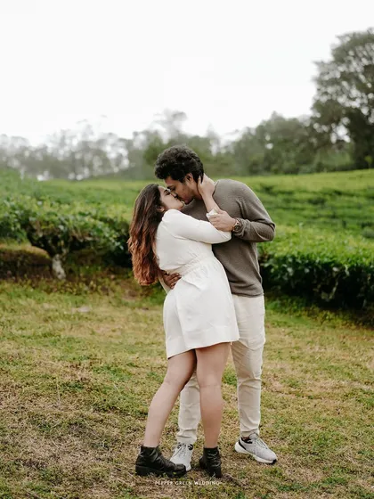 A sweet kiss amidst the lush green landscape. These are the timeless, romantic moments I strive to capture in every pre-wedding session.
