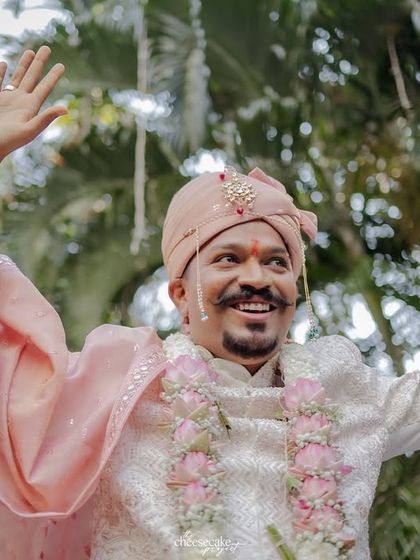 The groom's grand entrance, full of energy and happiness.