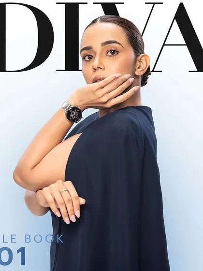 Styling actress Monica Chaudhary for the Noise campaign. This elegant navy cape dress creates a chic and powerful silhouette, showing that a "Diva" can be both strong and sophisticated.