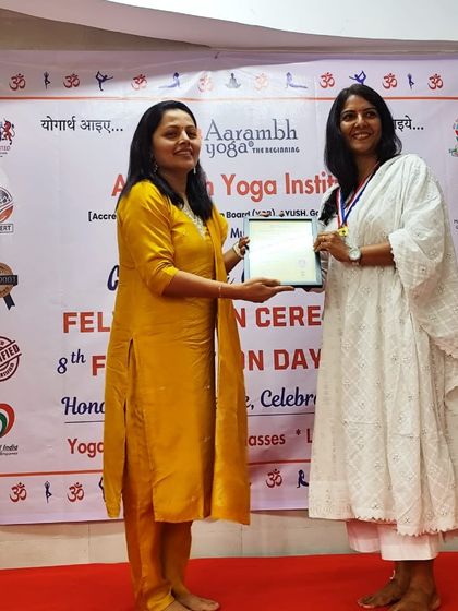 A student being awarded her certificate and medal on our Foundation Day, a testament to her dedication and successful completion of her course.