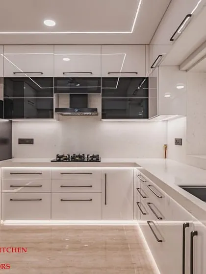 Another angle of our Mumbai Central project, showing the seamless integration of the refrigerator and the clean lines of the handleless cabinets, all powered by premium Blum hardware.