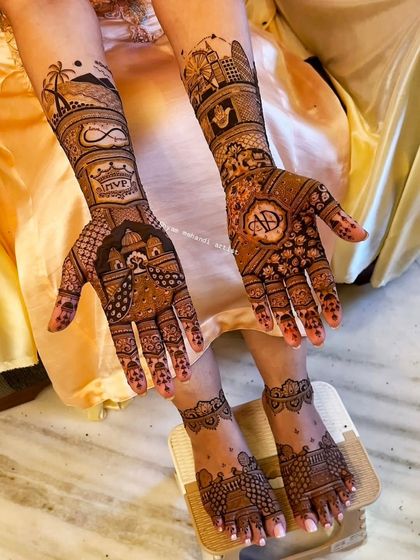 A full bridal look for a destination wedding, personalized with initials "MVP" and "AD" and symbols representing their story.