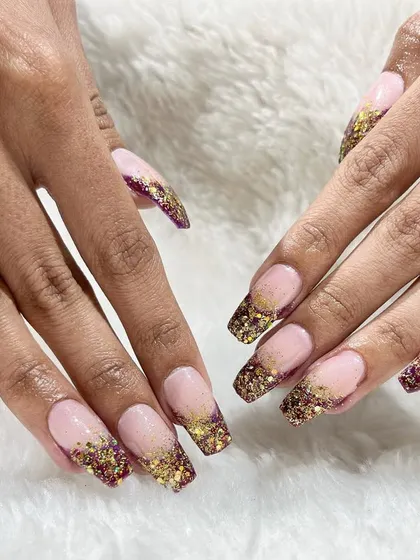 A beautiful set of glitter-encapsulated French tips. Our courses cover techniques for embedding glitter and other elements into acrylic and gel for a flawless finish.