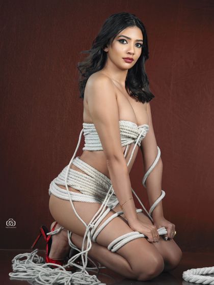 A creative concept shoot using ropes to create a unique outfit. This studio session was about texture and form, using dramatic lighting to highlight the interplay between the ropes and the model.