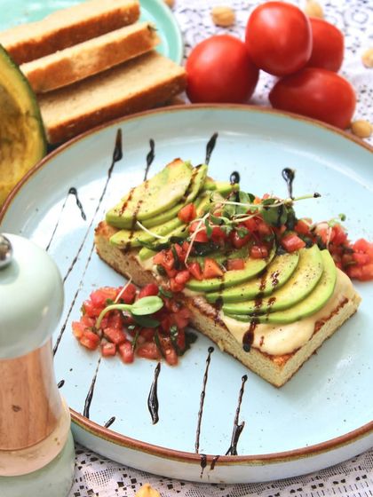 A weekend special, our exotic Open Avocado Toast is a culinary masterpiece. It features focaccia bread with hummus, avocados, and a zesty tomato salsa for a fusion of flavors.