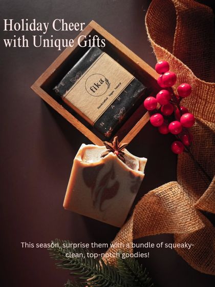 I love creating unique gifts that spread holiday cheer. This shot features two of my top-notch goodies: a packaged artisan soap and a hand-swirled bar, ready to surprise someone this season.