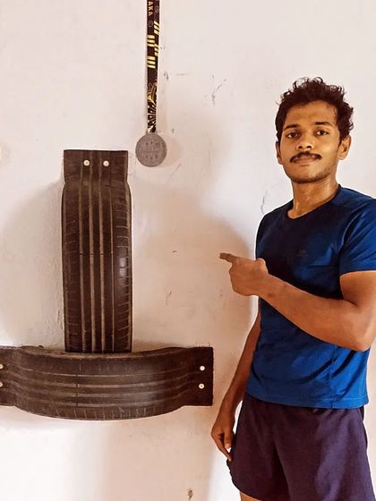 We get creative with our equipment. I built this punching station from old tires, it’s perfect for practicing hooks and uppercuts.