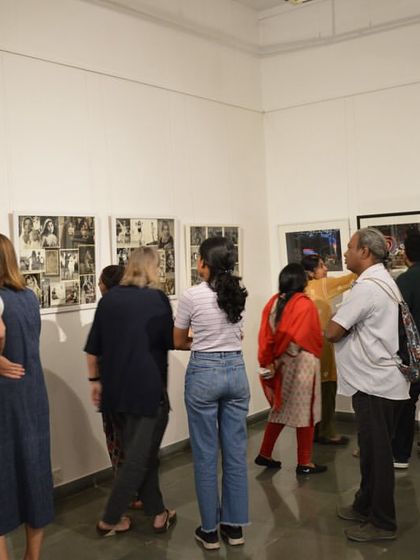The group from MAP listening intently to the artist's stories.