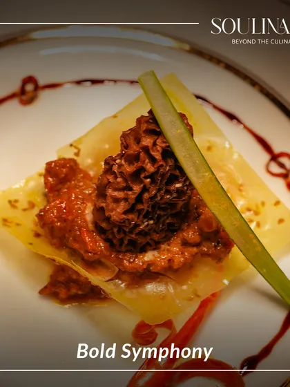 A bold symphony of flavours and textures. This dish features a morel mushroom atop a delicate sheet of pasta, artfully drizzled with a rich sauce, representing our commitment to redefining fusion cuisine.