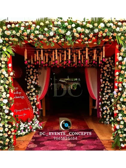First impressions matter. We crafted this magnificent floral entrance arch to welcome guests in style. The dense arrangement of fresh flowers creates a luxurious and inviting pathway into the event.