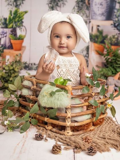 A wide shot of the enchanting bunny setup. I take great care in designing every detail, from the greenery to the rustic props, to create a complete magical world.
