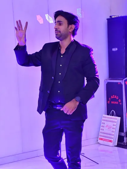 A full-body shot of me on stage, demonstrating my dynamic performance style.