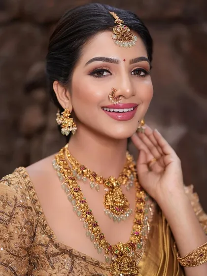 A happy, smiling portrait of the model, her makeup looking fresh and bright.