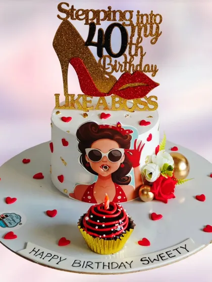 Another version of the "Like a Boss" 40th birthday cake, this time with a fun caricature and a matching cupcake.