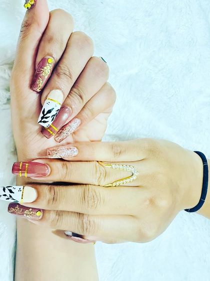 A closer look at the intricate details of this artistic, multi-patterned nail set.