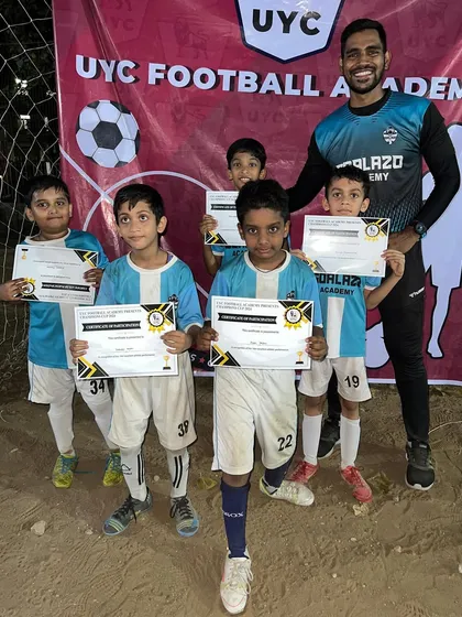 Our youngest U-7 players with their participation certificates from the UYC Championship.