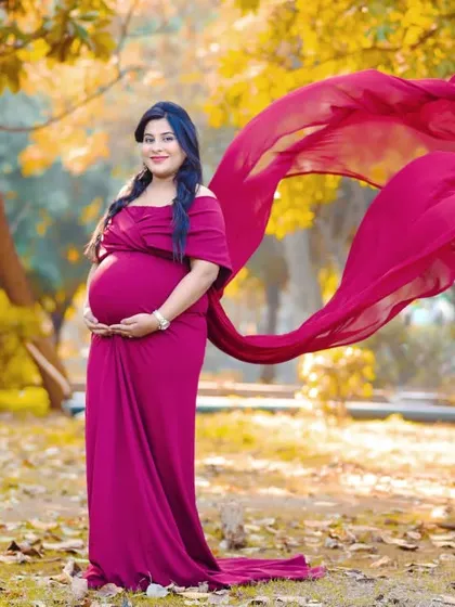 An outdoor session with one of my flowing maternity gowns is pure magic. The vibrant color and the toss of the fabric in a natural park setting make for such a joyful and powerful portrait.