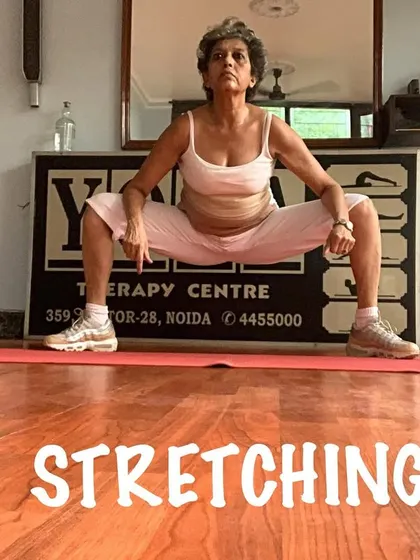 A deep squat stretch. This is a foundational movement for building lower body strength and hip mobility.