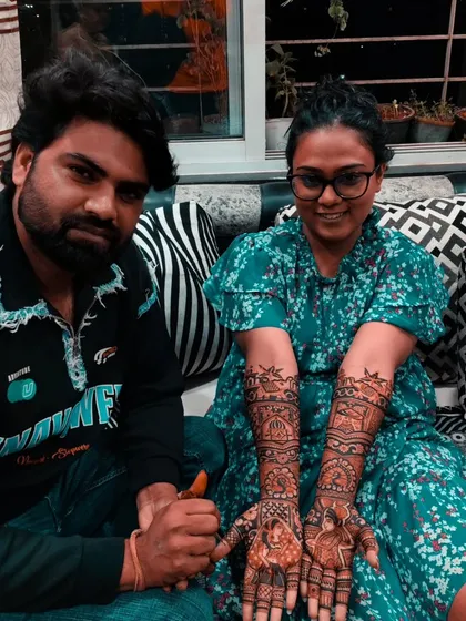 A happy client showing her portrait mehandi. I enjoy working closely with my clients to create their perfect design.