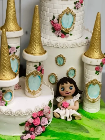 Another angle of the princess castle cake, showing how the figurine sits in her magical kingdom.