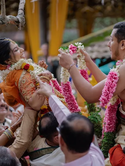 The playful and joyous 'varmala' or garland exchange ceremony, a highlight of many Indian weddings we host.