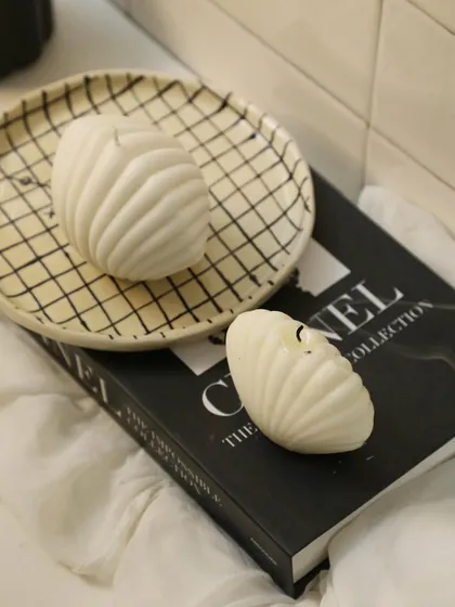We know how much you love our big oyster candle, so we introduced a small oyster candle to go with it.