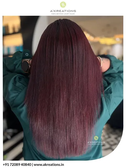 A vibrant, fiery red hair color transformation. I love creating bold looks that are full of life and shine, ensuring your hair stays healthy throughout the process.
