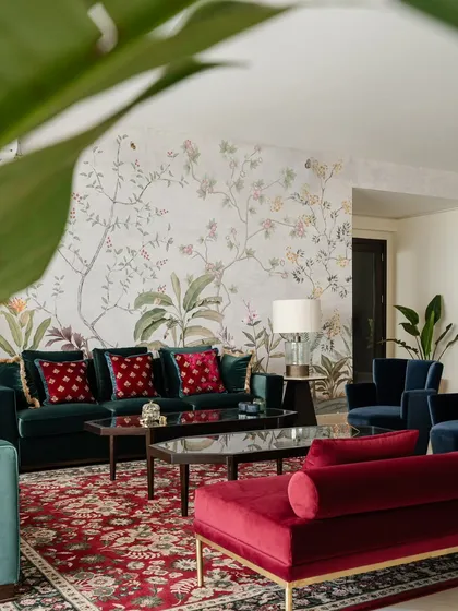 This angle shows how the sprawling floral mural wraps around the room, creating an immersive garden-like experience that is both elegant and timeless.