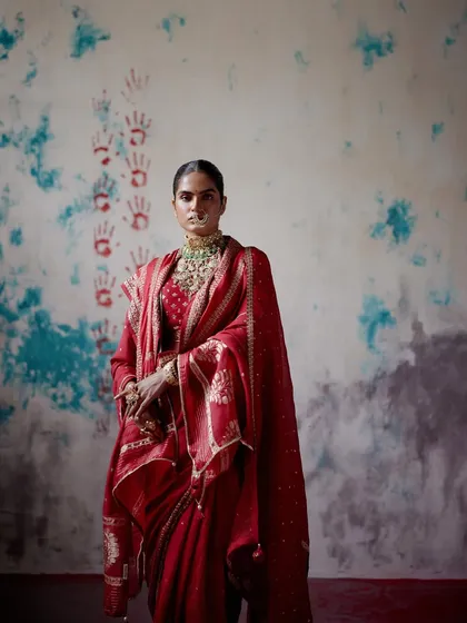 There is a unique power in a classic red saree. I work with you to find drapes that feel both royal and personal, styling them with heritage jewelry to create a look that is truly timeless.