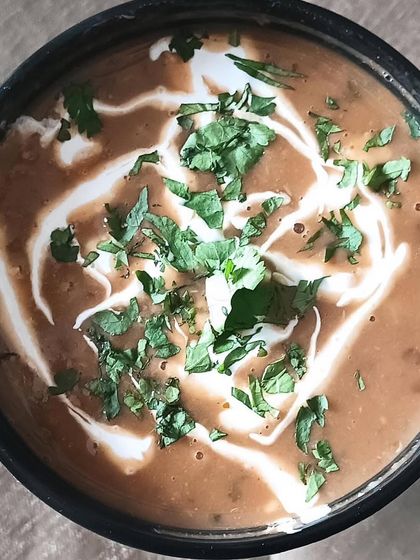 A close-up of my rich and creamy Dal Makhni. I slow-cook it for hours to develop that deep, smoky flavor that everyone loves.