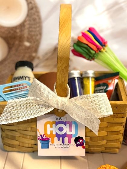 A close-up of our simple yet festive Holi hamper. It's easy to carry and perfect for spreading the colors of joy.