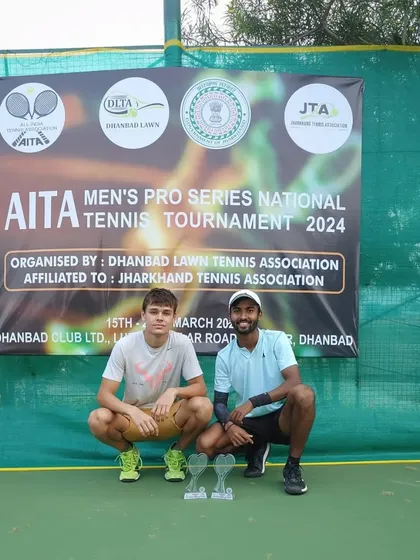 Anup Bangargi, on the right, after winning the doubles title at the All India 1 Lac National Men's Tournament in Jharkhand.