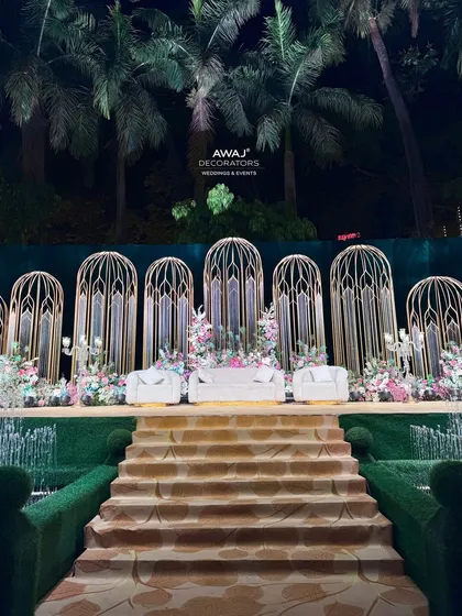 The stage viewed from the top of the stairs, a perspective that highlights the grandeur of the entrance and the intricate design of the backdrop.