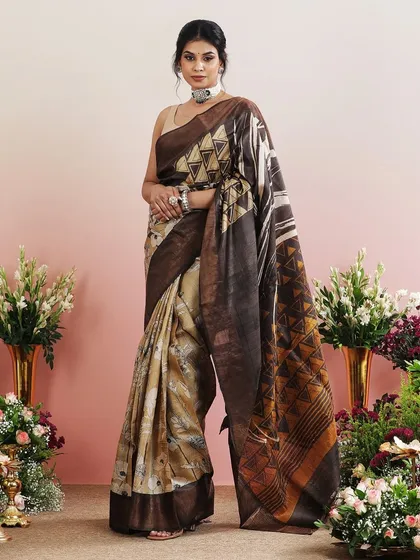 The combination of different prints and patterns makes this saree a true work of art.