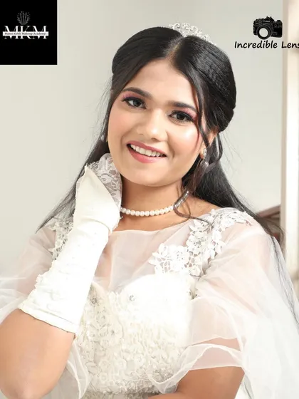 Creating a dreamy and elegant look for a Christian wedding. The focus here is on soft, romantic makeup with a dewy finish, ensuring the bride looks ethereal and feels comfortable in her white gown.