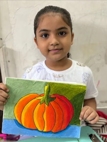 This vibrant pumpkin drawing demonstrates how we learn about shading and light to make objects look three-dimensional. It's a great example of the skills we build, from basic to advanced.