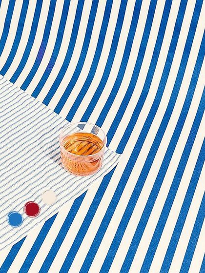 A canvas of indigo dreams. This flat-lay image captures the artistic details of the Transcendence Kimono Wrap set, with its rich blue stripes and bold red accents.