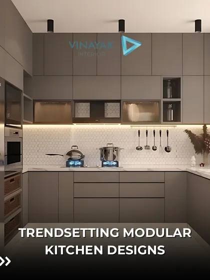 An example of a trendsetting modular kitchen with a sleek, minimalist design. The handleless cabinets and integrated appliances create a seamless look, perfect for a contemporary home.