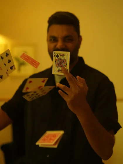 This photo captures a moment of magic, with the King of Spades seemingly floating. It represents the mind-bending illusions I create.