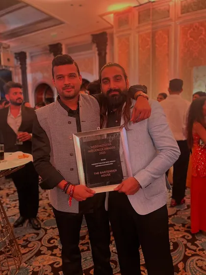 Posing with my award. This win belongs to every client who trusted me and every team member who has worked tirelessly to build our reputation.