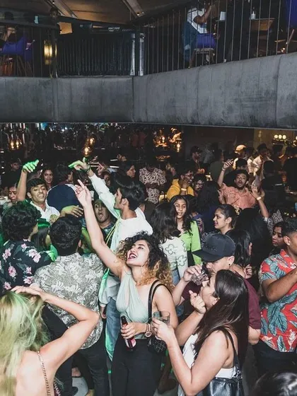 A view from my console at FLO, one of Bangalore's top clubs. I love seeing a packed, multi-level dance floor moving to the beat. This is the scale of energy I can bring to your corporate event or large party.