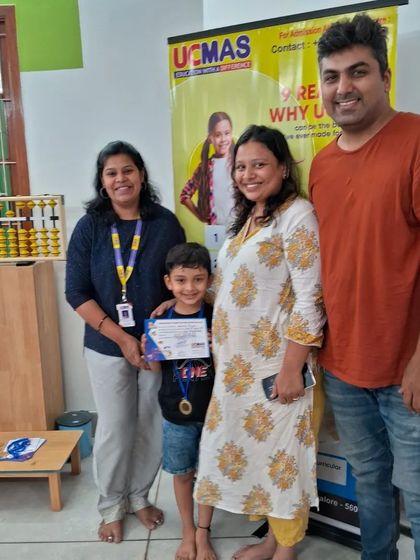 It's a family affair. We love seeing parents celebrate their children's achievements at our after-school program completion ceremonies.
