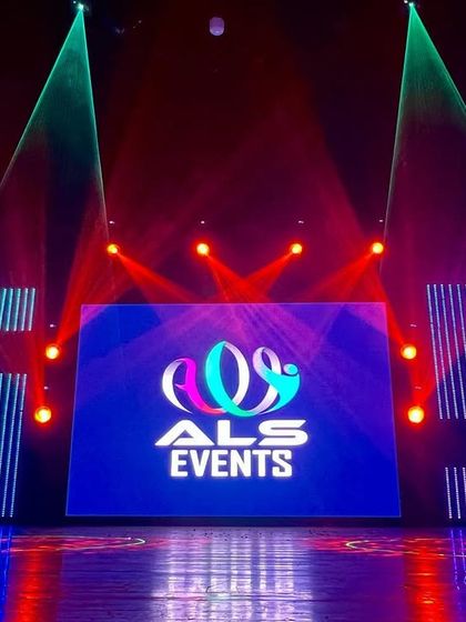For the GS Dance Academy's annual show, I created this custom stage featuring their initials as large, illuminated letters flanking the central LED screen, providing a unique branding opportunity.
