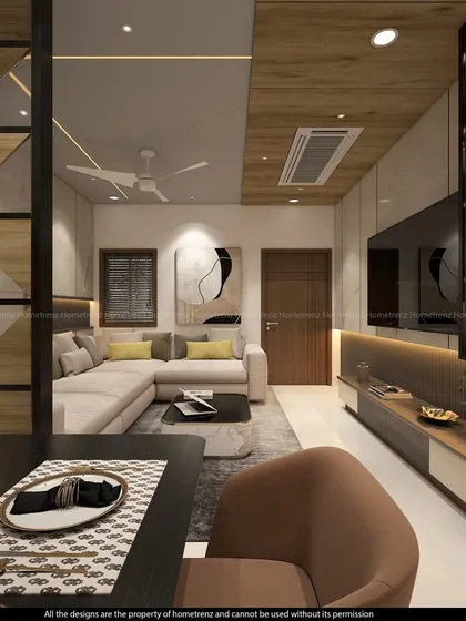 A view from the dining table into the living room. The open layout is perfect for entertaining, allowing for easy conversation between the two spaces.