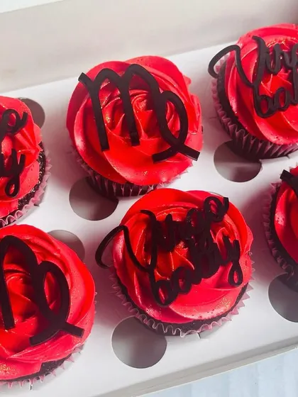 A slightly different angle of the Virgo cupcakes, showing the glossy finish on the custom acrylic toppers. I can source toppers for any zodiac sign to personalize your order.
