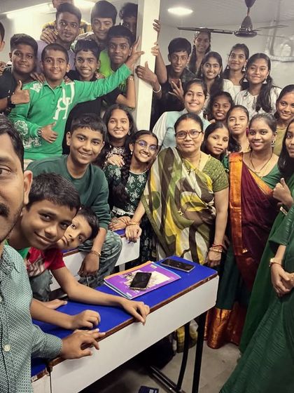 A selfie with our students and teachers, all smiles in their green outfits for the fifth day of Navratri celebrations.