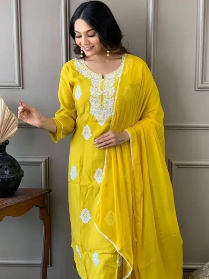 Brighten up your day with this yellow viscose chanderi kurta set. The white thread embroidery gives it a fresh, summery feel.